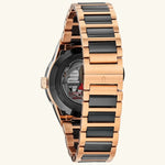 Load image into Gallery viewer, Bulova Millennia Latin GRAMMY® watch with black dial and rose gold case, elegant timepiece featuring sleek design.