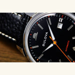 Load image into Gallery viewer, Bulova Summer Wind Frank Sinatra watch with black dial, elegant design, and stainless steel case, ideal for classic style.