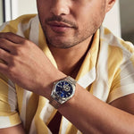 Load image into Gallery viewer, Bulova Surveyor watch with blue dial and stainless steel bracelet, featuring a classic round face and elegant design.