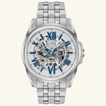 Load image into Gallery viewer, Bulova Sutton Classic blue skeleton dial automatic watch with stainless steel case and bracelet, showcasing intricate inner mechanics.