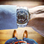 Load image into Gallery viewer, Bulova Sutton Classic blue skeleton dial automatic watch with stainless steel case and bracelet.