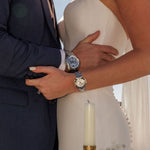 Load image into Gallery viewer, Bulova Sutton Classic blue skeleton dial automatic watch with stainless steel case and band, showcasing intricate watch mechanics.